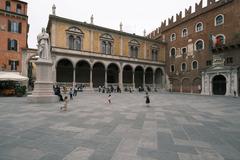 Piazza dei Signori in Verona with statues and historic buildings