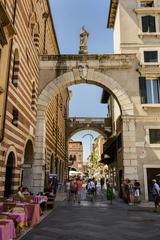 Arco della Costa archway leading to Piazza dei Signori in Verona