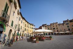 aerial view of Lucca, Italy with historic buildings and lush greenery