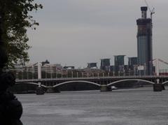 Chelsea Bridge at dusk with lights reflecting on the Thames river