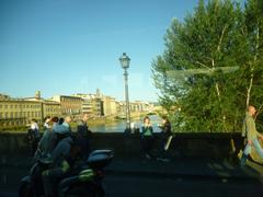 View of the Arno River in Florence with historical buildings on both sides, taken in May 2014