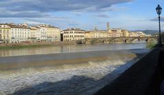 Arno River with buildings and bridges along its banks