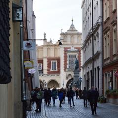 Adam Mickiewicz Statue and Sukiennice from Sienna street in Kraków