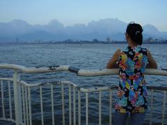 woman looking across the Han River in Da Nang, Vietnam