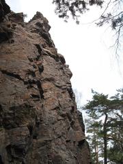 rock climbers on a cliffside