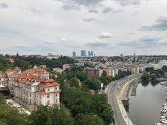 Scenic view of Praha city skyline with historic buildings and Vltava River