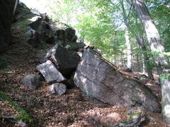 Scenic view of Babí lom rocky ridge with forested slopes