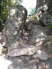 Scenic view of Babí lom rocky ridge with lush green trees