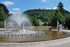 Singing Fountain in Mariánské Lázně with Caroline's Spring Colonnade in the background