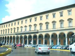 Piazza della Libertà in Florence with historic buildings and a central monument