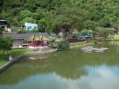 Scenic view of Dahu Park with bridge and lake