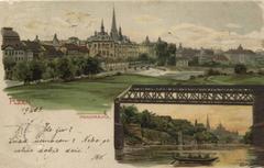 Panorama of Plzeň with a small image of a boat on a river in front of the city