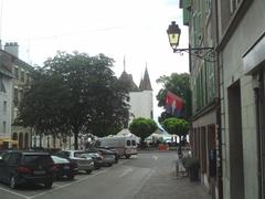 Nyon Castle in Switzerland with surrounding cobblestone square