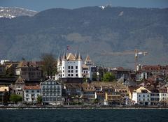 Lake view of Nyon, Switzerland with waterfront buildings