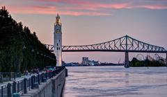 Clock Tower and Jacques-Cartier bridge viewed from the Old Port quays in Montreal