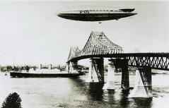 CP Steamship and R100 passing the Harbour Bridge in Montreal, 1930