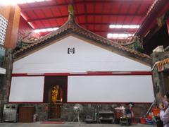 Scenic view of Baozangyan Temple amidst lush greenery