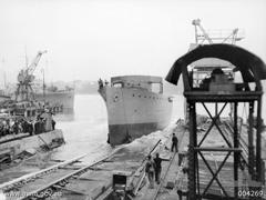 HMAS Bathurst being launched at Cockatoo Dockyard, Sydney