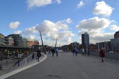 Street scene in Hamburg with people walking and a mix of modern and traditional architecture