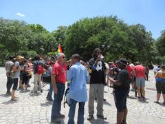 Parade in Armstrong Park against Confederate monuments