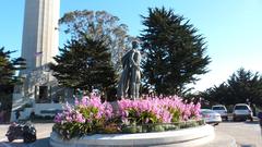 Statue of Christopher Columbus with Coit Tower in the background in San Francisco