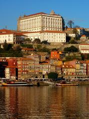 a picturesque view of Porto, Portugal with colorful buildings along the Douro River