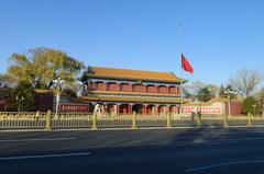 Xinhuamen with the national flag at half-mast