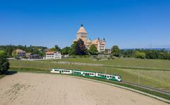 MBC Be 4/4 train passing Château de Vufflens in Switzerland