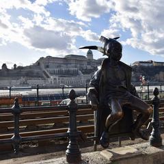 Little Princess Statue on the railings of the Danube promenade in Budapest, Hungary