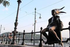 Little Princess statue on Danube promenade in Budapest