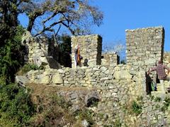 Sun Gate at Machu Picchu with scenic view of mountains in Peru