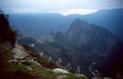 First view of Machu Picchu before sunrise from Inti Punku on the Inca Trail