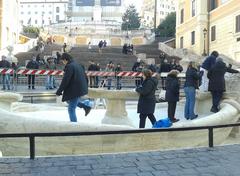 Inspectors examining Barcaccia Fountain after damage by Feyenoord hooligans on January 18 2015