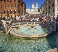 Barcaccia fountain and Spanish Steps in Rome