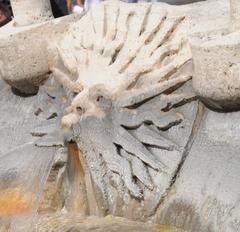 Detail of the Fontana della Barcaccia showing the Sun symbol of the Barberini family