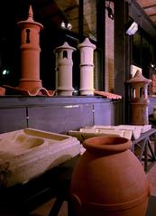 terracotta artifacts displayed in a museum