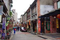 Shekeng Historical Street in Shenkeng with traditional buildings and lanterns