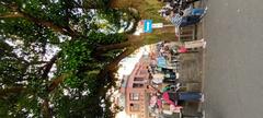 Shenkeng Old Street entrance with a large Dom tree landmark