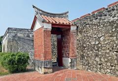 Old City Wall with Laogu stones and concrete, featuring a semi-arch gate and North Gate embossed with Shen Tu and Yu Die