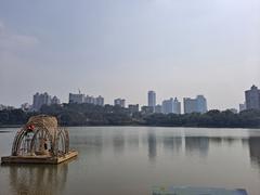 scenic view of Luhu Park with a lake and surrounding greenery