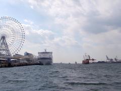 Ajigawa River near Osaka Port with ships docked and sailing