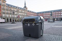 Yellow recycling containers in Plaza Mayor, Madrid