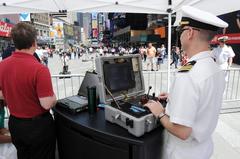 Cmdr. Heath Rasmussen demonstrates Mark II Talon robot during Fleet Week New York in Times Square