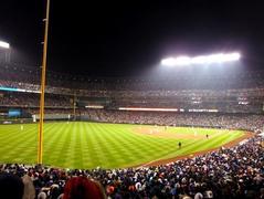 Coors Field at night with a crowded stadium