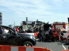 Film set on Lambeth Bridge with crew and equipment