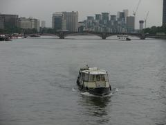 River Thames view from London Eye, with boats and city skyline