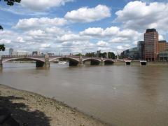 Lambeth Bridge viewed from Millbank with clear sky and Westminster Tower in the background