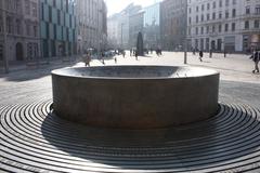 Fountain at Náměstí Svobody in Brno with the Brno Astronomical Clock in the background