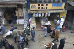 Bustling alley beside Rüstem Pasha Mosque in 2006 with second-hand clothes trade