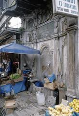 Historic fountain against mosque wall in Istanbul